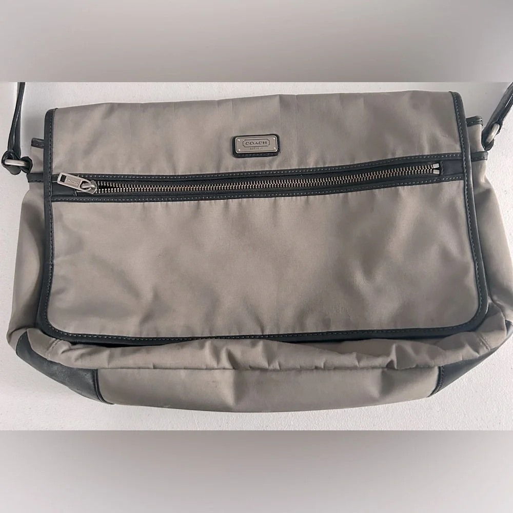 Unisex Coach crossbody messenger bag.
